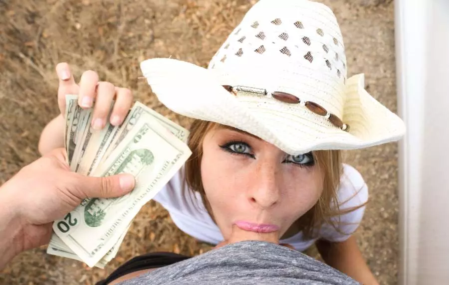 Stranded blonde cowgirl sucks dick for money photo