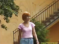 Dame peeing outdoors