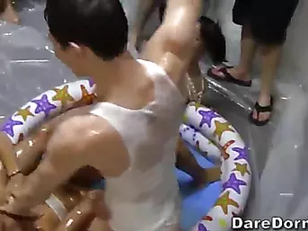 A college baby oil wrestling party at its best