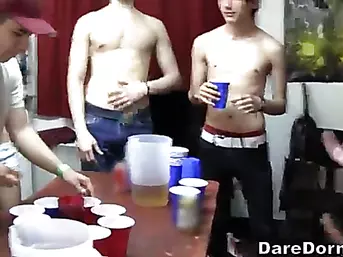 An strip beer pong game goes to the next sexy level.